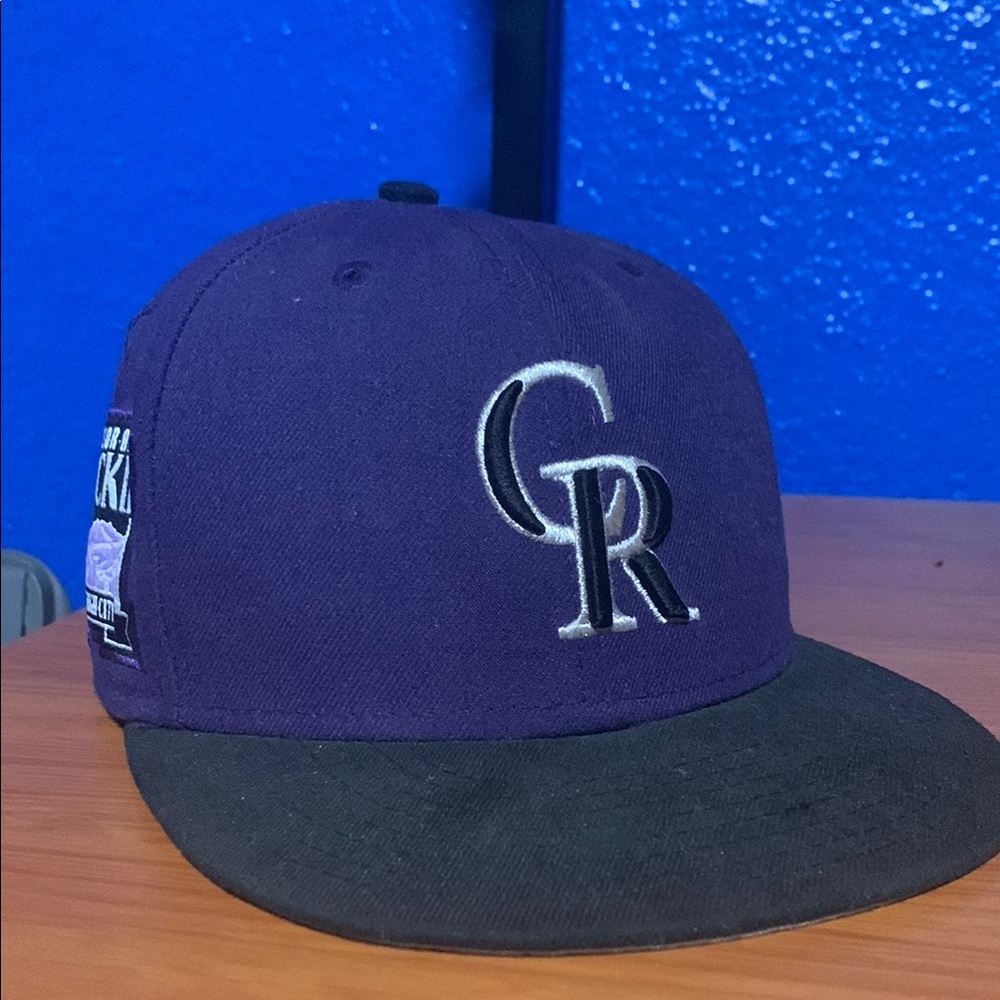 Purple and Black New Era 59fifty Colorado Rockies baseball cap. 7 1/8